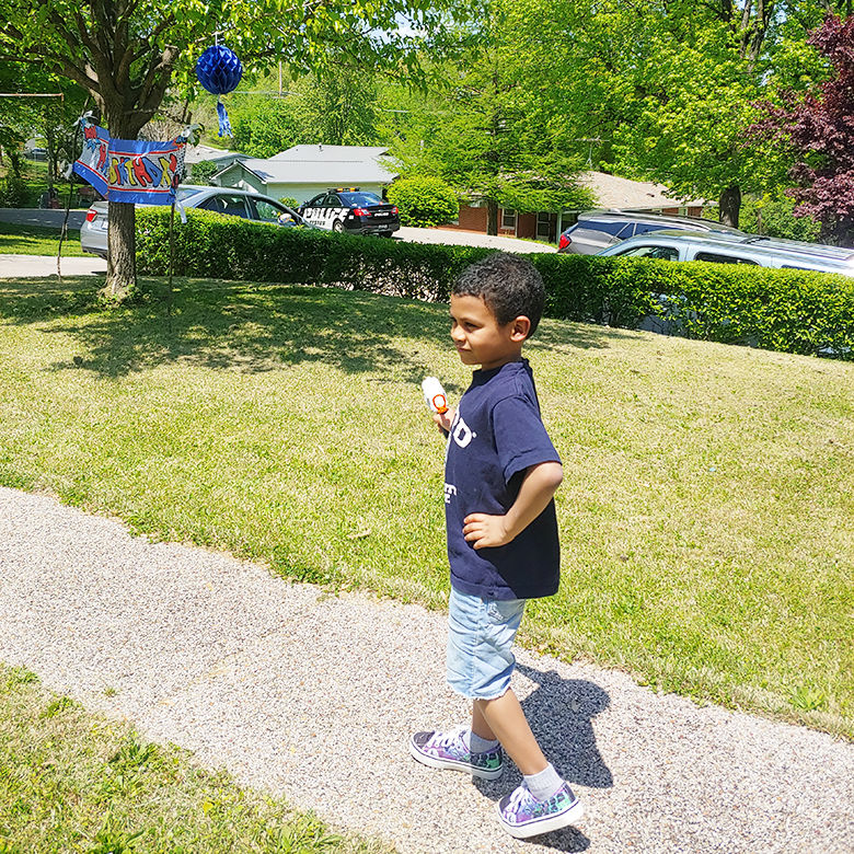 Festus youngster thrilled with birthday parade that included police car